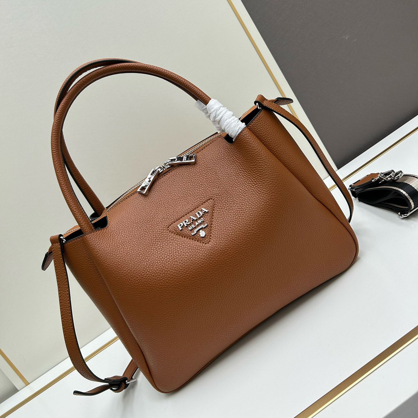 Pra*a top handle bags